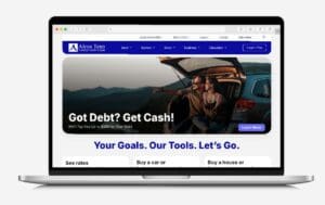 Image of a laptop with the ATFCU website home page depicted on it